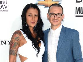 Musician Chester Bennington of Linkin Park and wife Talinda Ann Bentley arrive at the 2012 Billboard Music Awards held at the MGM Grand Garden Arena on May 20, 2012 in Las Vegas, Nevada.  (Frazer Harrison/Getty Images for ABC)