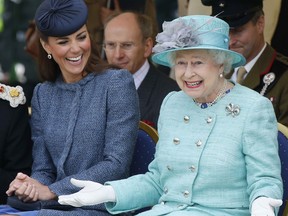Catherine, Duchess of Cambridge, and the Queen watch part of a children's sports event while visiting Vernon Park during a Diamond Jubilee visit to Nottingham on June 13, 2012 in Nottingham, England.  (Phil Noble - WPA Pool/Getty Images)