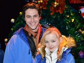 Ryan McCartan and Dove Cameron and the cast of Disney's Liv and Maddie visited The Queen Mary's CHILL where they toured the chilling Ice Kingdom and sat ice skating rink-side to sign autographs for fans on December 17, 2014 in Long Beach, California.  (
