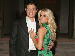 Singers Jessica Simpson and husband Nick Lachey attend the "Gucci Spring 2006 Fashion Show Benefitting The Childrens Action Network" at Michael Chow's residence November 17, 2005 in Beverly Hills, California.