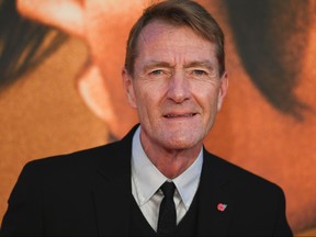 British author Lee Child (real name Jim Grant), author of the Jack Reacher novel series, poses upon arrival for the European premiere of the film "Jack Reacher: Never Go Back" in central London on Oct. 20, 2016.  (JUSTIN TALLIS/AFP via Getty Images)