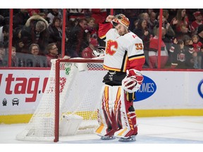 Jan 18, 2020; Ottawa, Ontario, CAN; Calgary Flames goalie David Rittich (33) reacts after allowing a goal in the second period against the Ottawa Senators at the Canadian Tire Centre. Mandatory Credit: Marc DesRosiers-USA TODAY Sports ORG XMIT: USATSI-405739