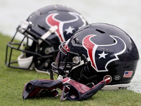 A detailed view of the helmets of the Houston Texans sit on the sideline prior to the game between the Houston Texans and the Baltimore Ravens at M&T Bank Stadium on Nov. 17, 2019, in Baltimore, Md.