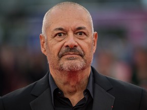 French director Jean-Pierre Jeunet poses on the red carpet as he arrives for the opening ceremony of the 45th Deauville U.S. Film Festival, on Sept. 6, 2019 in Deauville, France.
