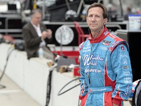 In this May 19, 2010, file photo, John Andretti watches during practice for the Indianapolis 500 at the Indianapolis Motor Speedway in Indianapolis. (AP Photo/AJ Mast, File)