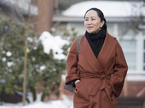 Meng Wanzhou, chief financial officer of Huawei, leaves her home in Vancouver, Jan. 17, 2020 as she heads to B.C. Supreme Court for a case management hearing. (THE CANADIAN PRESS/Jonathan Hayward)