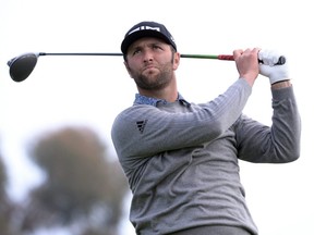 Jon Rahm plays his shot from the 14th tee during the third round of the Farmers Insurance Open at Torrey Pines Municipal Golf Course-South Co., in San Diego, on Saturday, Jan. 25, 2020.