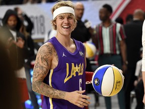 Justin Bieber has revealed details on an upcoming album and North American tour. (THE CANADIAN PRESS/AP-Chris Pizzello)