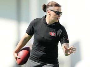 Offensive assistant coach Katie Sowers of the San Francisco 49ers looks on during practice for Super Bowl LIV at the Greentree Practice Fields on the campus of the University of Miami on January 30, 2020 in Coral Gables, Florida. (Michael Reaves/Getty Images)