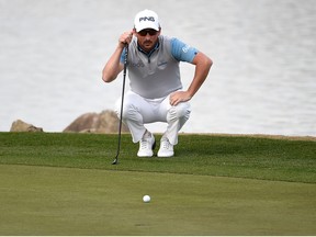 Andrew Landry putts in to win on the 18th green during the final round of The American Express tournament at the Stadium Course at PGA West
on Jan. 19, 2020 in La Quinta, Calif.