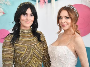 Aliana (L) and Lindsay Lohan attend the Network 10 marquee on Melbourne Cup Day at Flemington Racecourse on Nov. 5, 2019 in Melbourne, Australia.
