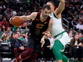 Grant Williams of the Boston Celtics defends Kevin Love of the Cleveland Cavaliers during the second half at TD Garden on Dec. 9, 2019, in Boston.