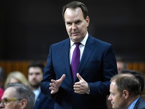 In this May 17, 2019, file photo, Parliamentary Secretary to the Minister of Public Services and Procurement and Accessibility Steven MacKinnon rises during Question Period in the House of Commons on Parliament Hill in Ottawa on Friday.