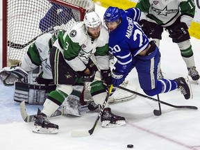 Toronto Marlies’ Mason Marchment gets tangled up with Texas Stars’ Dillon Heatherington during Game 7 of the 2018 Calder Cup Final at the Ricoh Coliseum in Toronto on Thursday June 14, 2018. (Ernest Doroszuk/Toronto Sun)