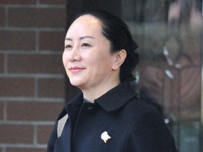 Huawei chief financial officer Meng Wanzhou leaves her Vancouver home to go to her extradition hearing in British Columbia Supreme Court on Jan. 22, 2020, in Vancouver.