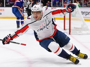 Washington Capitals left wing Alex Ovechkin (8) celebrates his goal against the New York Islanders at Nassau Veterans Memorial Coliseum. (Dennis Schneidler-USA TODAY Sports)