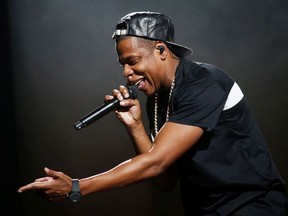 American rapper Jay-Z performs at Bercy stadium in Paris, October 17, 2013.