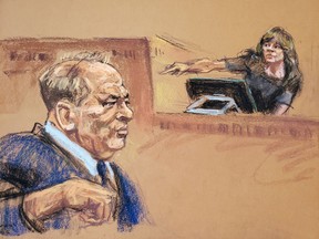 Rosie Perez points at film producer Harvey Weinstein as she testifies during Weinstein's sexual assault trial at New York Criminal Court in the Manhattan borough of New York City, Jan. 24, 2020, in this courtroom sketch.