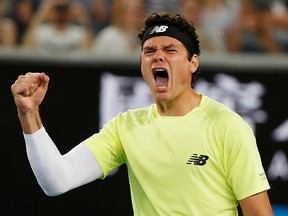 Canada's Milos Raonic celebrates after his win over Stefanos Tsitsipas Friday at the Australian Open in Melbourne. (REUTERS/Issei Kato)