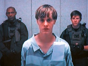 Dylann Storm Roof appears by closed-circuit television at his bond hearing in Charleston, S.C., June 19, 2015, in a still image from video.