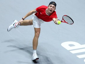 Denis Shapovalov of Canada stretches to play a forehand in his singles final match against Rafael Nadal of Spain during Day 7 of the 2019 Davis Cup at La Caja Magica on Nov. 24, 2019, in Madrid, Spain.