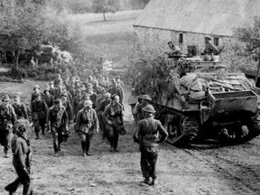 German troops surrender to Canadian forces as the Allies smash their way through France into Nazi Germany crushing the Hun in June 1944. (Calgary Herald file photo)