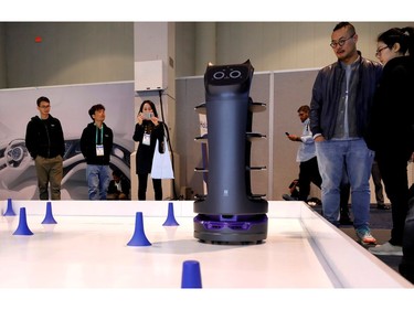 The BellaBot delivery robot manoeuvres around a course in the PuduTech booth during the 2020 CES in Las Vegas on Jan. 8, 2020.