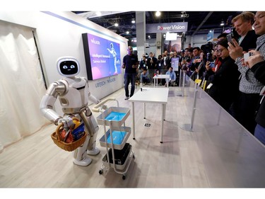 Walker, an intelligent humanoid service robot, gives a demonstration at the UB Tech booth during the 2020 CES 
in Las Vegas on Jan. 8, 2020.