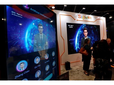 An AI virtual news anchor delivers the news at the Sogou booth during the 2020 CES 
in Las Vegas on Jan. 8, 2020.