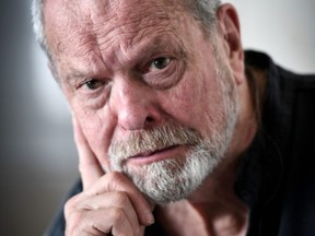 In this file photo taken on March 13, 2018, film director Terry Gilliam poses during a photo session at the Opera Bastille in Paris.