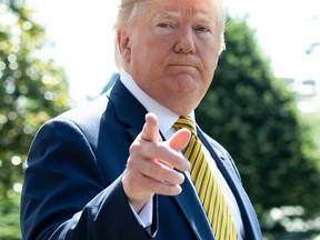 In this file photo taken on June 22, 2019, U.S. President Donald Trump speaks to the media prior to departing on Marine One from the South Lawn of the White House in Washington, D.C.