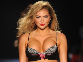 Kate Upton walks the runway at the Beach Bunny Swimwear show during Merecdes-Benz Fashion Week Swim 2012 at The Raleigh on July 15, 2011, in Miami Beach, Fla.