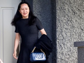 Huawei's Financial Chief Meng Wanzhou leaves her family home in Vancouver May 8, 2019.