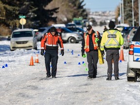 Police are investigating the scene in Bowness where a woman was found in distress and later died on Monday, February 10, 2020. Azin Ghaffari/Postmedia