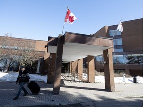 At the NAV Canada Training Institute Wednesday, ambulances and first responders buzzed around the building while workers assembled temporary fencing around an isolated wing of the building.