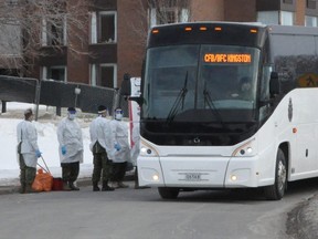 Several army personnel could be seen with medical gowns and masks, on Friday Feb. 21, 2020 in Cornwall, Ont. (Francis Racine/Cornwall Standard-Freeholder/Postmedia Network)