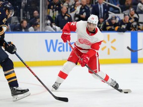 Andreas Athanasiou (72) of the Detroit Red Wings takes a shot on goal against the Buffalo Sabres at KeyBank Center on Feb. 11, 2020 in Buffalo, N.Y.