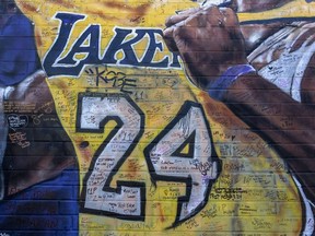 Messages written by fans are seen on a mural for former Los Angeles Lakers basketball star Kobe Bryant during the official memorial ceremony for him and his daughter, Gianna, at nearby Staple Center on February 24, 2020 in Los Angeles, California.