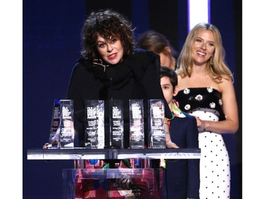 Francine Maisler, left, and Scarlett Johansson accept the Robert Altman Award for "Marriage Story" onstage during the Independent Spirit Awards.