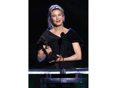 Renee Zellweger accepts the Best Female Lead award for "Judy: onstage during the 2020 Film Independent Spirit Awards.