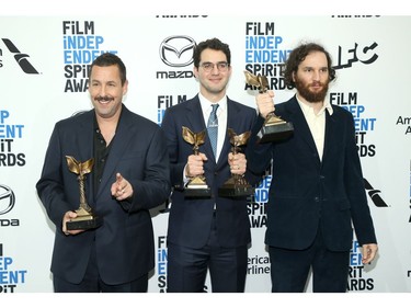 Adam Sandler poses with Best Directors for "Uncut Gems" Benny Safdie and Josh Safdie poses in the press room during the  2020 Film Independent Spirit Awards