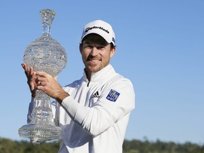 Nick Taylor of Canada poses with the trophy after winning the AT&T Pebble Beach Pro-Am at Pebble Beach Golf Links on February 09, 2020 in Pebble Beach, California. (Photo by Chris Trotman/Getty Images)
