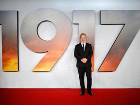 In this file photo taken on December 4, 2019 British director Sam Mendes poses on the red carpet as he arrives to attend the world premiere of the film ‘1917’ in London. (TOLGA AKMEN/AFP via Getty Images)