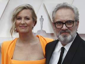 Sam Mendes and his wife Alison Balsom pose on the red carpet during the Oscars arrivals at the 92nd Academy Awards in Los Angeles, Calif., Feb. 9, 2020. REUTERS/Eric Gaillard