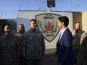 Prime Minister Justin Trudeau visits with Canadian troops at Camp Canada at Ali al Salem Air Base in Kuwait on Monday, Feb. 10, 2020.