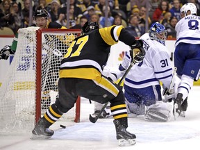 Penguins captain Sidney Crosby scores on Maple Leafs goaltender Frederik Andersen during the second period in Pittsburgh on Tuesday night. (Gene J. Puskar/The Associated Press)