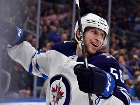 Winnipeg Jets winger Jansen Harkins celebrates after scoring his first NHL goal Thursday, Feb. 6,  2020, against the St. Louis Blues at the Enterprise Center.