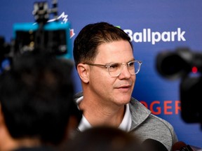 Blue Jays general manager Ross Atkins holds his first media scrum of spring training Friday in Dunedin, Fla.
