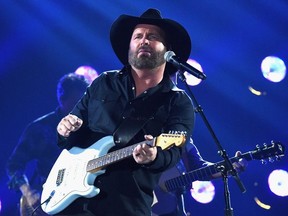 Garth Brooks performs onstage at the 51st annual CMA Awards at the Bridgestone Arena on November 8, 2017 in Nashville, Tennessee.