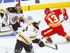 The Calgary Flames Johnny Gaudreau goes in on Boston Bruins goaltender Tuukka Rask during NHL third period action at the Scotiabank Saddledome in Calgary on Wednesday October 17, 2018.